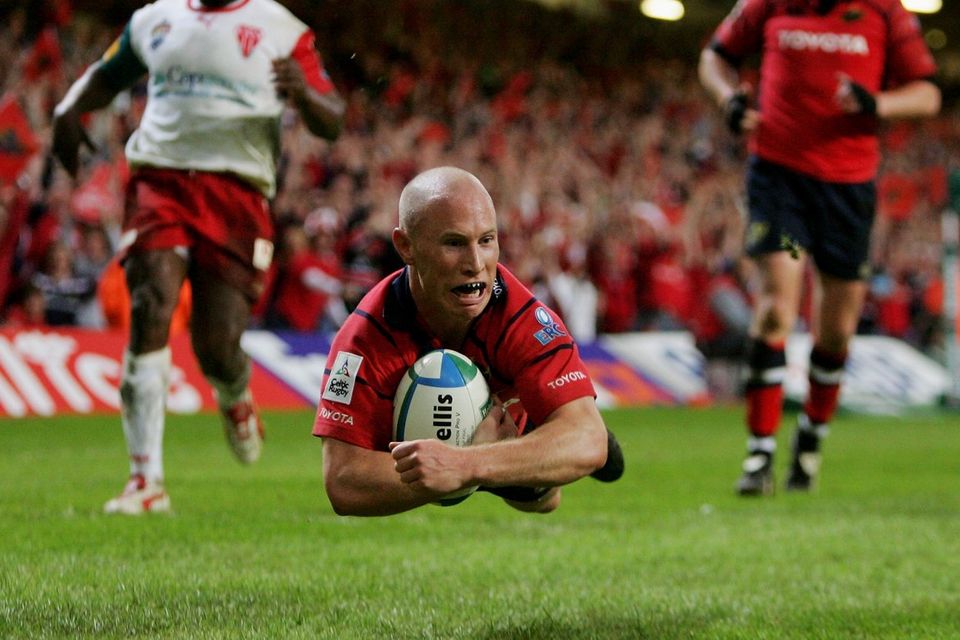 Peter Stringer dives over to score a try for Munster against Biarritz in 2006. Photo: Stu Forster/Getty Images
