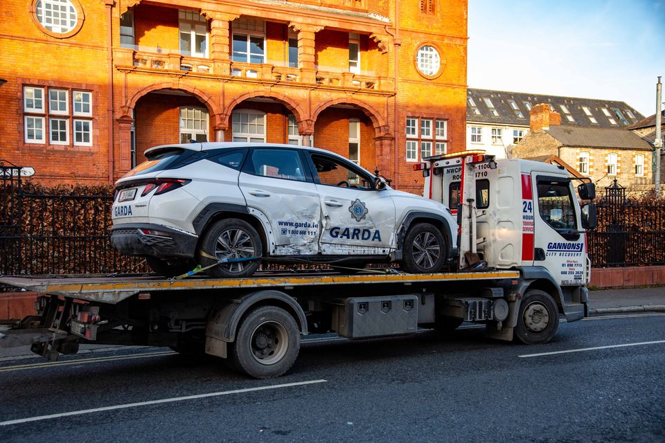 A Garda car is taken away from the scene of an incident in Dublin city centre. Photo: Damien Storan.