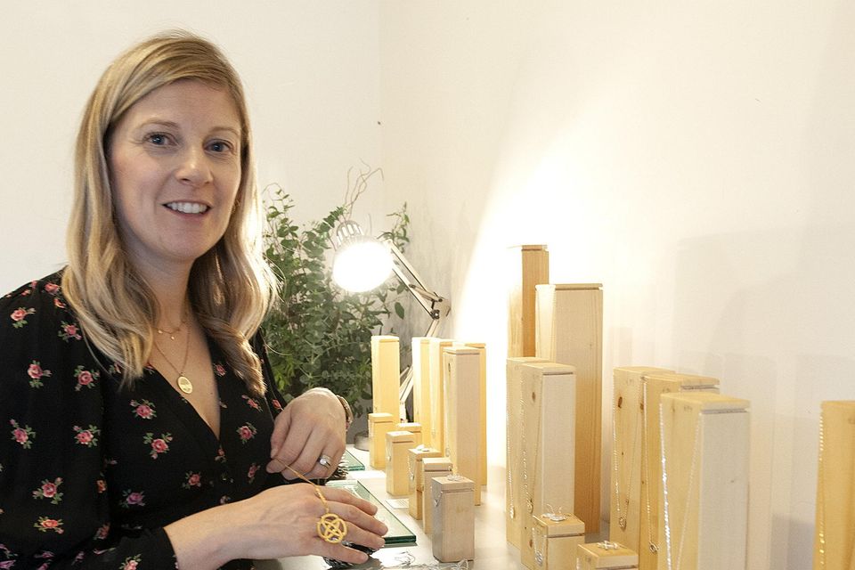Áine Breen with a selection of jewellery at the Liwu Jewellery Christmas 2022 pop-up shop. Pic: Jim Campbell