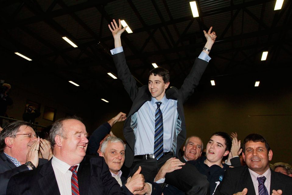 Simon Harris celebrates as he wins his Dáil set in Greystones in 2011. Photo: Michael Kelly