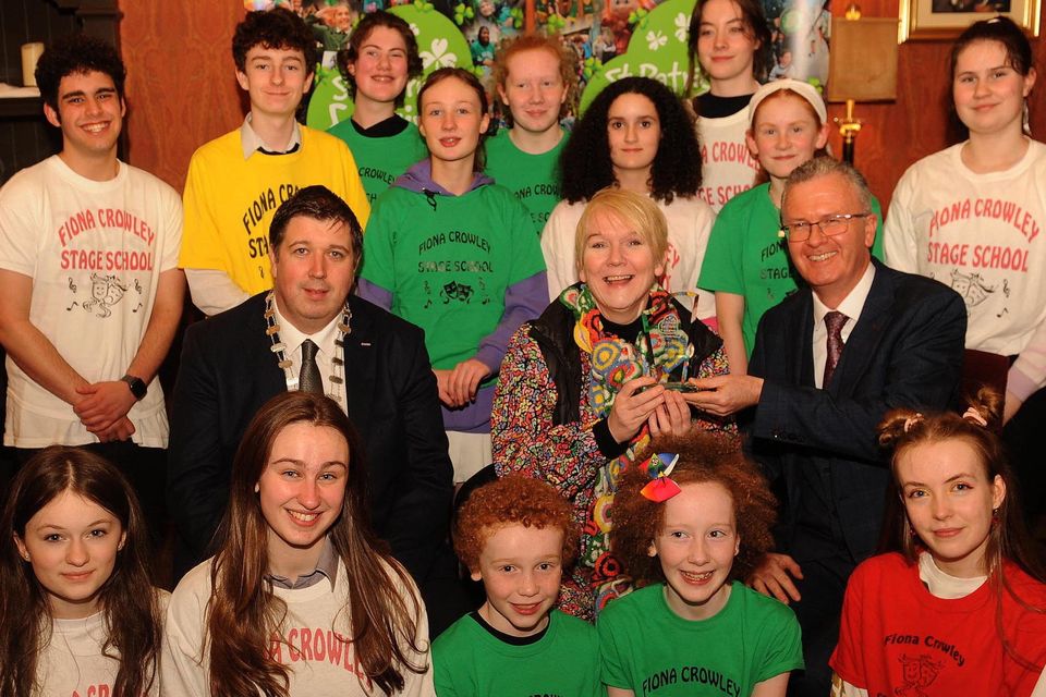 Fiona Crowley and members of the Fiona Crowley Stage School, winners of the Best School Award, with Cllr Niall Kelleher, Mayor of Killarney, and PJ McGee, Daly's SuperValu, sponsor, at the St. Patrick's Festival Killarney parade prizegiving function in The International Hotel on Tuesday night. Picture: Eamonn Keogh
