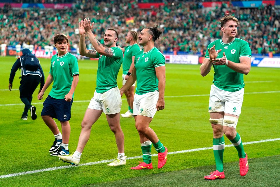 Ireland's Mack Hansen (centre) with team-mates after the final whistle in the Rugby World Cup 2023, Pool B match at the Stade de France in Paris, France