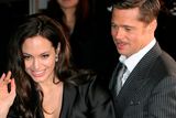 thumbnail: Actress Angelina Jolie (L) waves to fans with actor Brad Pitt (R) during 'The Curious Case of Benjamin Button' Japan Premiere at Roppongi Hills on January 29, 2009 in Tokyo, Japan. The film will open in Japan on Feburary 7.  (Photo by Kiyoshi Ota/Getty Images)