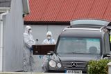 thumbnail: Mr Brogan's remains are removed from his home in Castlebar. Photo: Paul Mealey