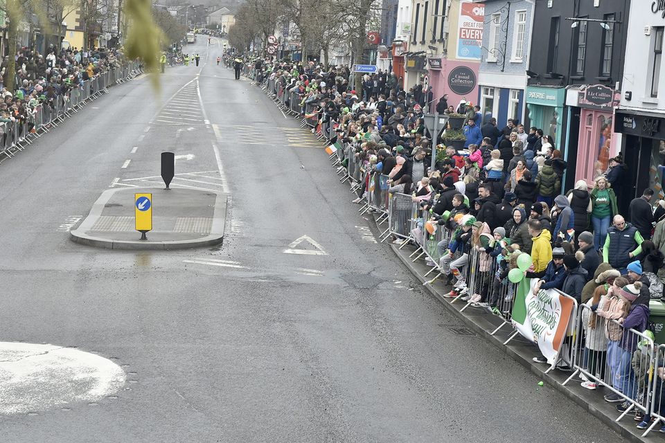 Spectators line the main street for the St Patrick's Day parade in Gorey. Pic: Jim Campbell