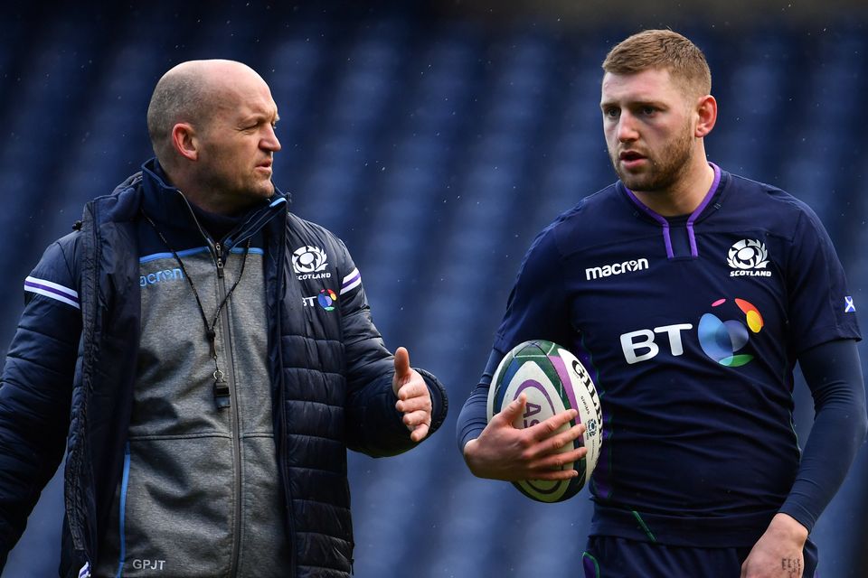 Scotland Head coach Gregor Townsend, left, and Finn Russell have had plenty of ups and downs together. Photo by Ramsey Cardy/Sportsfile