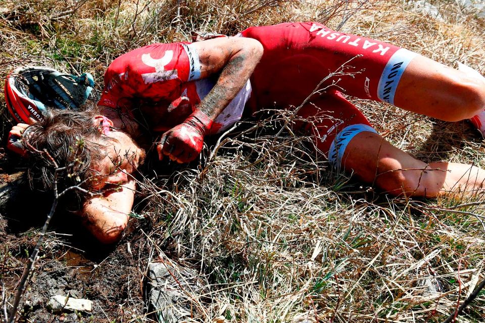 Russia’s Ilnur Zakarin lies in a ditch after crashing during the Colle dell’Agnello downhill on stage 19 of the Giro d’Italia (Getty Images)