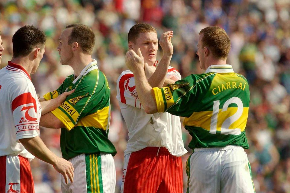 Tyrone's Conor Gormley and Cormac McAnallen tussles with Kerry's John Crowley and Liam Hassett during the 2003 All-Ireland semi-final. Photo: Sportsfile