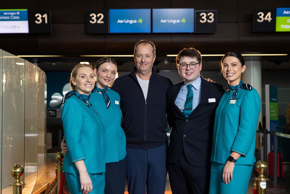 Aer Lingus cabin crew Deborah Byrne, Doina Manoli, Jamie Reynolds and Lia Zekonovic welcoming Andrew Lowe, Co-CEO and founder of Element Pictures and producer of ‘Poor Things’. Picture: Naoise Culhane