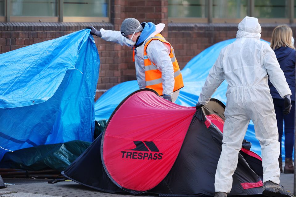 Workers dismantle tents at Mount Street in Dublin. Photo: Steve Humphreys