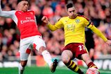 thumbnail: Burnley's Stephen Ward and Arsenal's Alex Oxlade-Chamberlain (left) battle for the ball Photo: PA