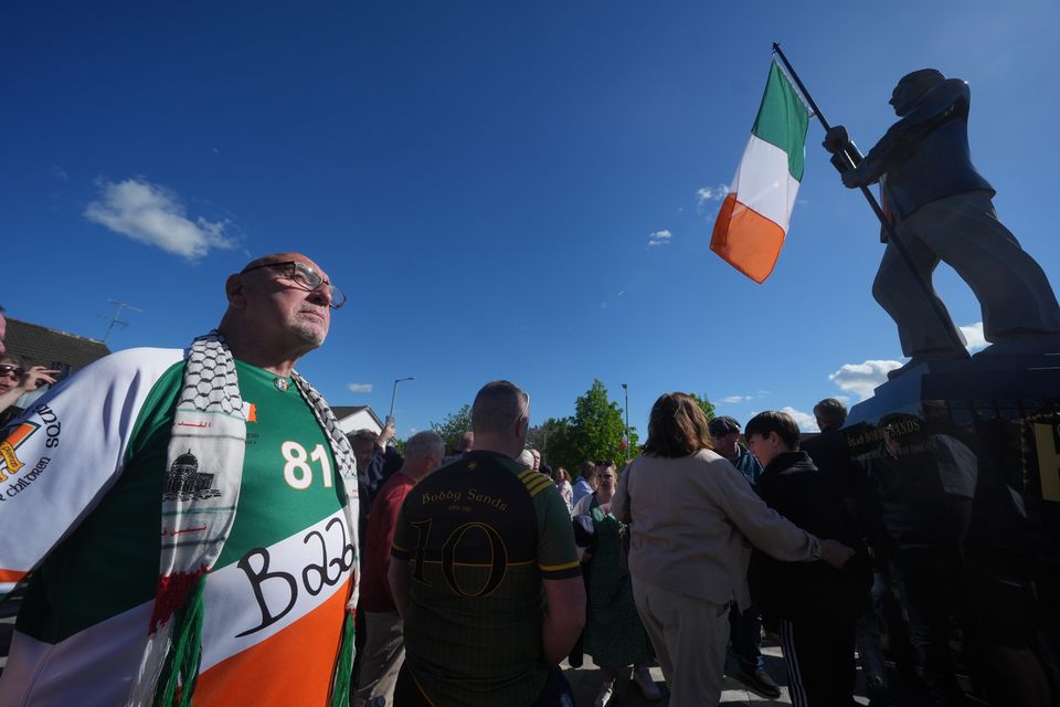 Members of the pubic attend the unveiling of the Bobby Sands statue (Brian Lawless/PA)