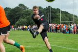 thumbnail: Sport Against Racism Ireland (SARI) organised a Sari All-Stars v Love/Hate cast football match. Fran Coonan takes a shot at goal with Jenny Murphy, Irish Rugby Team diving for cover.