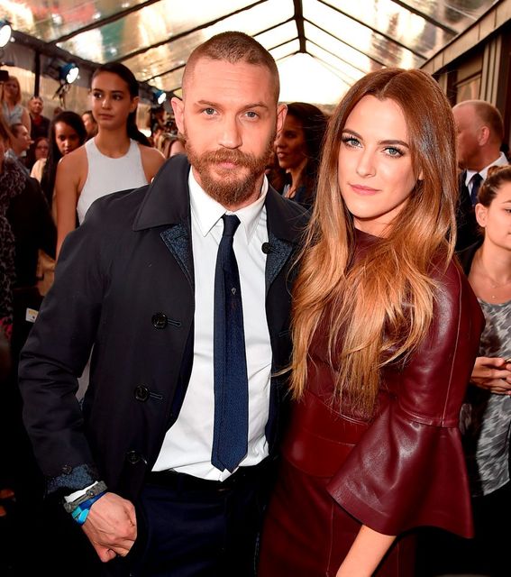 Actors Tom Hardy (L) and Riley Keough attend the premiere of Warner Bros. Pictures' "Mad Max: Fury Road" at TCL Chinese Theatre on May 7, 2015 in Hollywood, California.  (Photo by Kevin Winter/Getty Images)