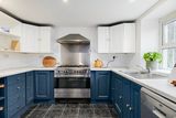 thumbnail: The kitchen with its blue presses