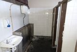 thumbnail: The interior of the public toilets before upgrades were carried out.