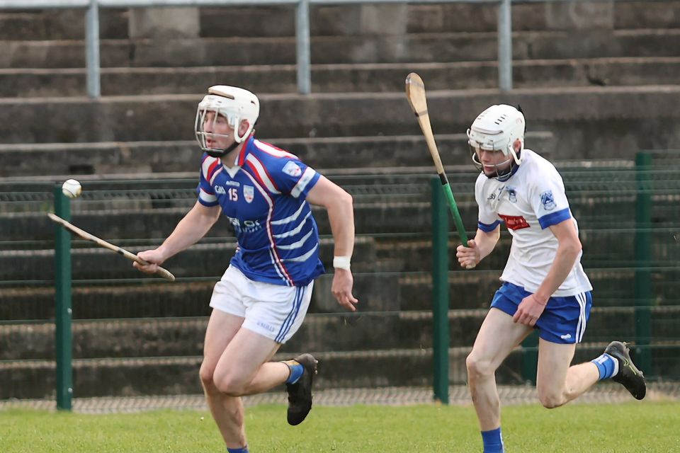Barndarrig's Jacques McCall is chased by Éire Óg's Christy Connors. 