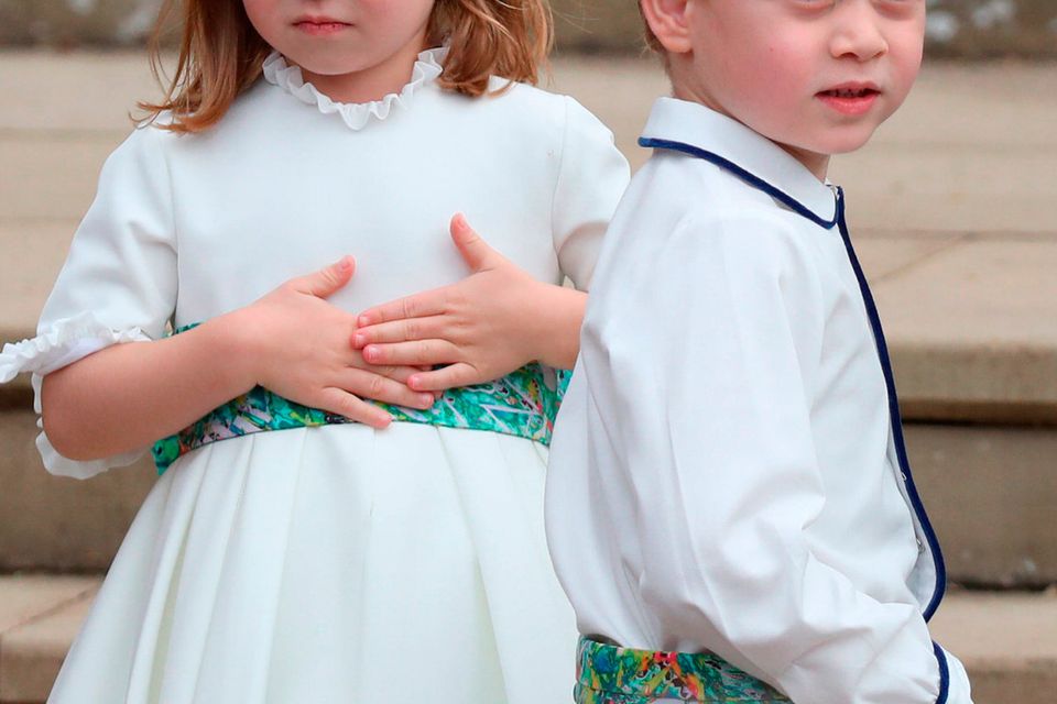 Princess Charlotte and Prince George arrive for the wedding of Princess Eugenie to Jack Brooksbank at St George's Chapel in Windsor Castle