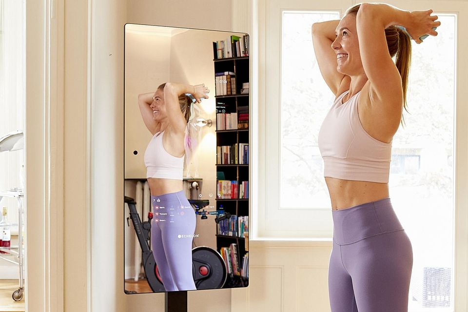 The Echelon Reflect Touch 50” Smart Fitness Mirror features on-screen AI instructors