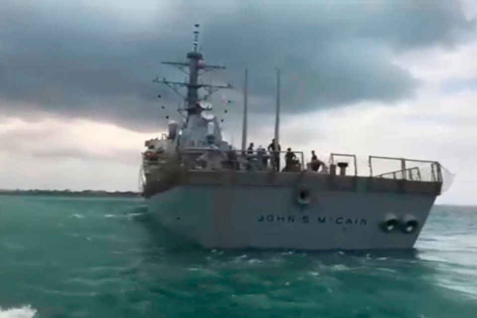 The U.S. Navy guided-missile destroyer USS John S. McCain is seen after a collision, in Singapore waters in this still frame taken from video August 21, 2017. REUTERS/Reuters TV