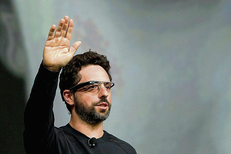 Sergey Brin, co-founder of Google, wears Google glasses while speaking at a conference in San Francisco