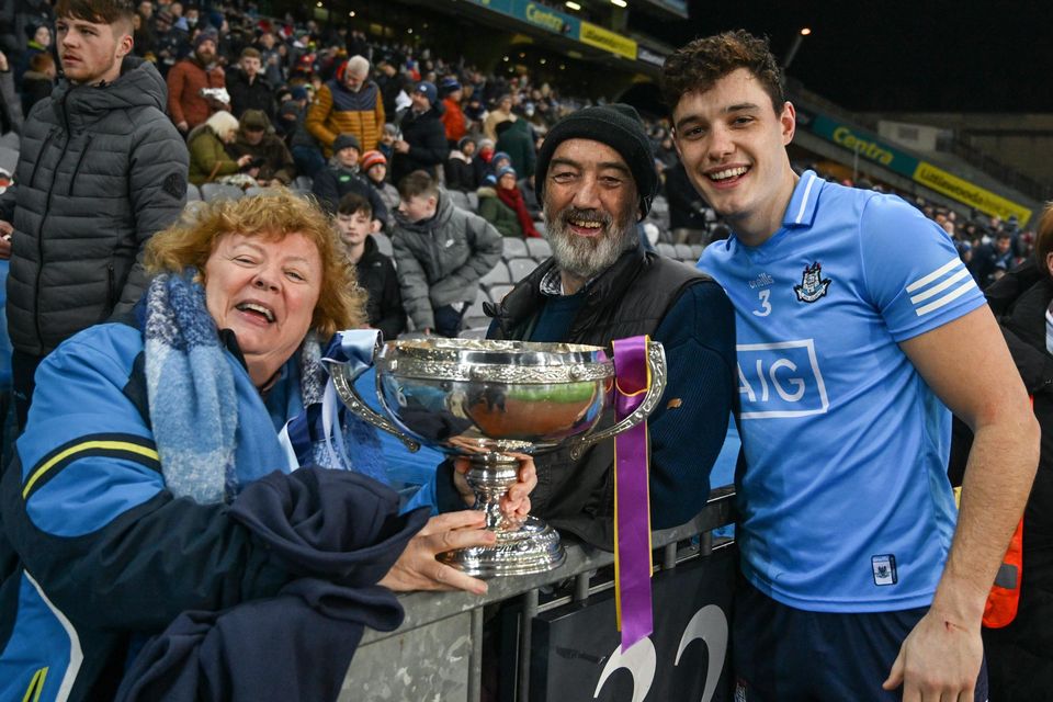 Dublin's Eoghan O'Donnell with his mum, Mary, and his dad, Mick, after captaining his side to victory in the Walsh Cup final against Wexford at Croke Park in late January. Photo: Ray McManus/Sportsfile