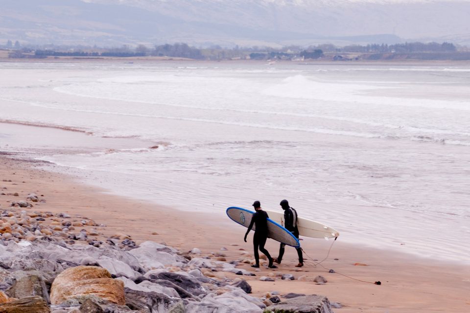 Surfers brave the cold at Strandhill, Co. Sligo