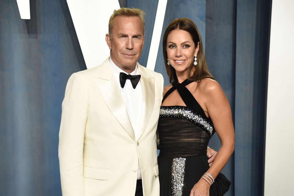 Kevin Costner, left, and Christine Baumgartner (Evan Agostini/Invision/AP)