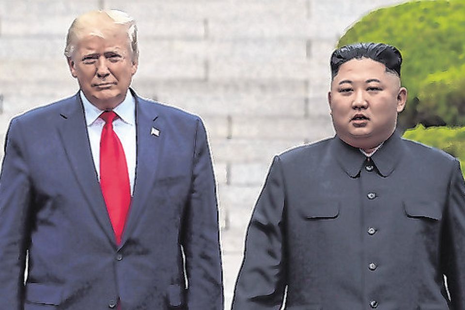 Brief encounter: Donald Trump and Kim Jong-un meet at the Korean border. Photo: Susan Walsh/AP