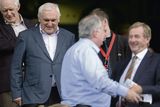 thumbnail: Bertie Ahern and his brother Maurice find seats as  Taoiseach Enda Kenny, right, speaks with Pat Rabbitte