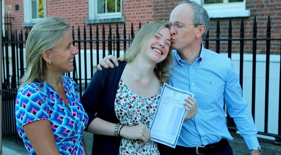 Aoife Corcoran with her parents after receiving her eight A1s. Photo: Kyran O'Brien