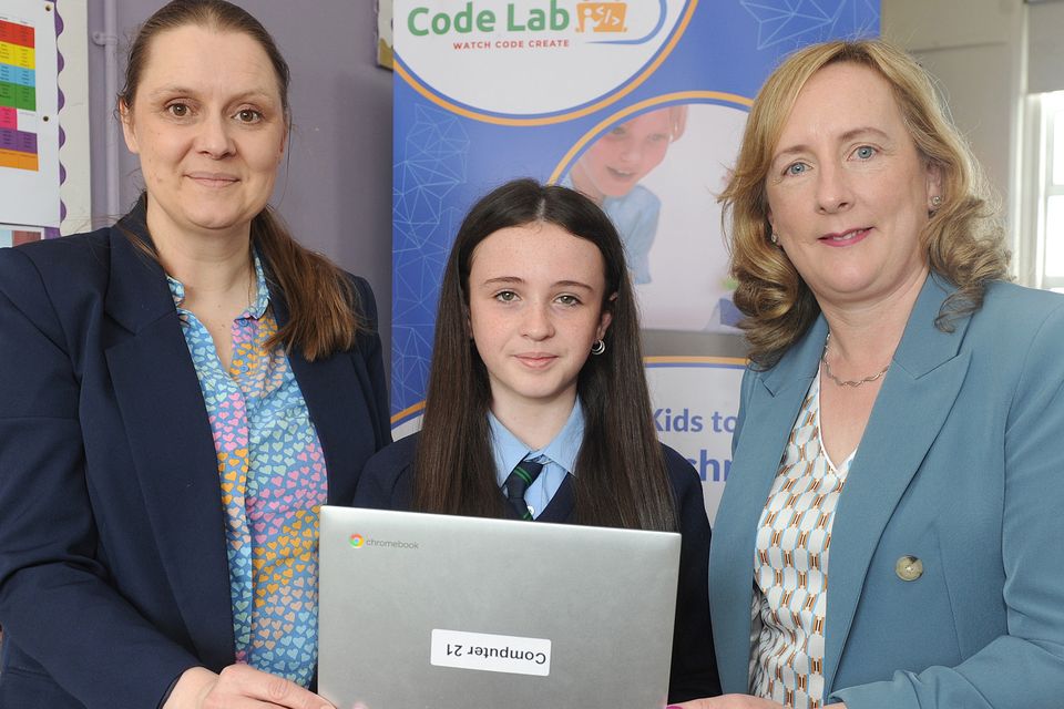 Teacher, Sabrina McArdle, 6th class pupil, Naomi Conway and Joan McCann, The Code Lab in Castletown Girls' School. Photo: Aidan Dullaghan/Newspics
