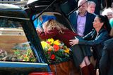 thumbnail: Mourners pay their tribute. Photos: Frank McGrath, Mark Condren