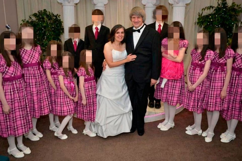 Louise and David Turpin with their 13 children, who were found chained to their beds, in a photo from their Facebook page