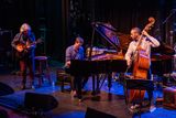 thumbnail: Jazz In The Round on stage at the Mermaid, opening for Orchestra Baobab: Tommy Halftery, Greg Felton and Cormac O'Brien. Photo: Leigh Anderson
