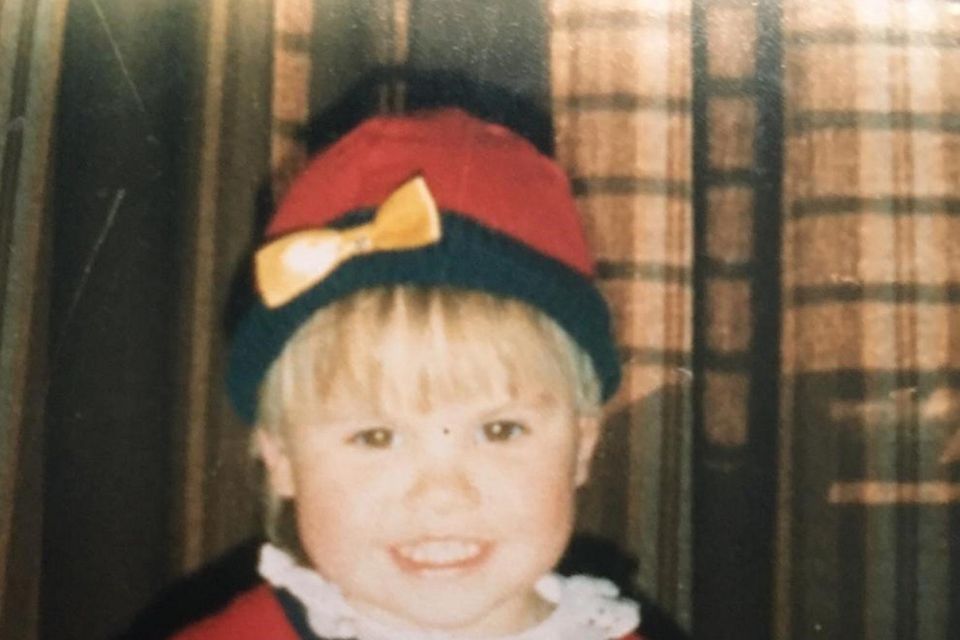 Lyra as a child.
