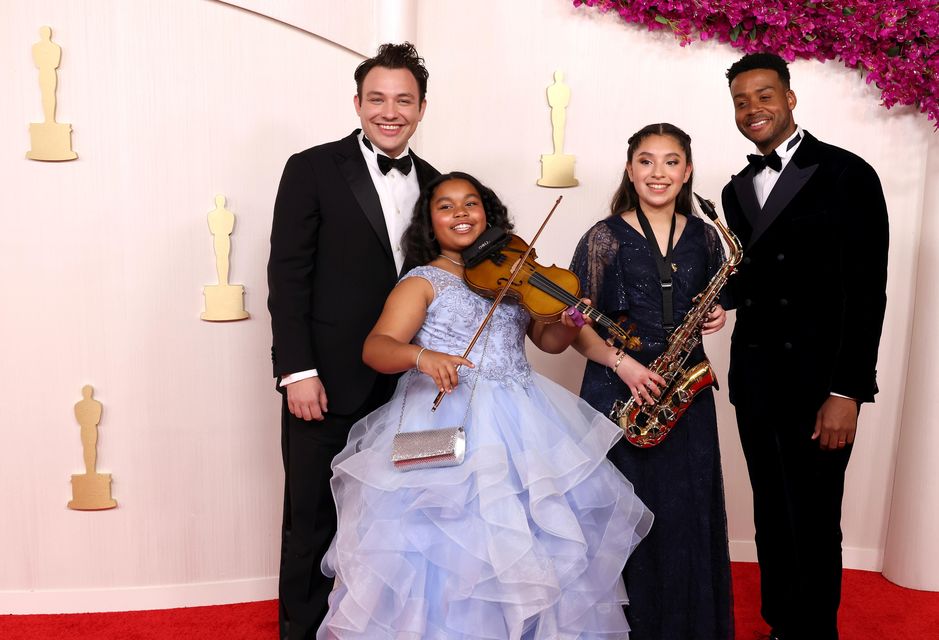 Ben Proudfoot, Porche Brinker, Ismerai Calcaneo and Kris Bowers attend the 96th Annual Academy Awards on March 10, 2024 in Hollywood, California. (Photo by John Shearer/WireImage)