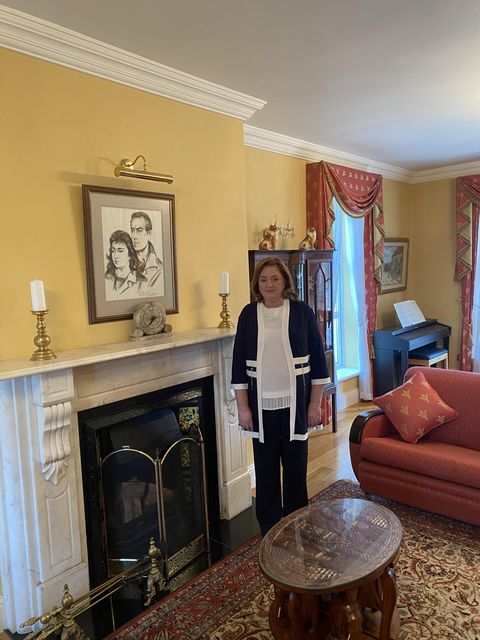 Drumure's current owner Patricia Kiernan beside a framed sketch of herself and her late husband Francis in their younger years