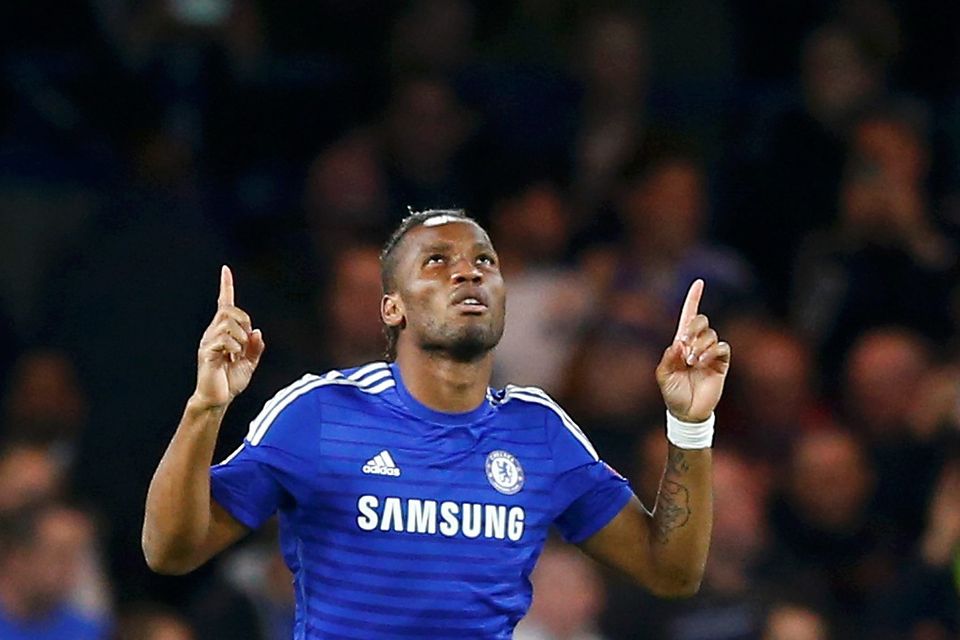 Chelsea's Didier Drogba celebrates after scoring a penalty during their Champions League Group G soccer match against Maribor at Stamford Bridge