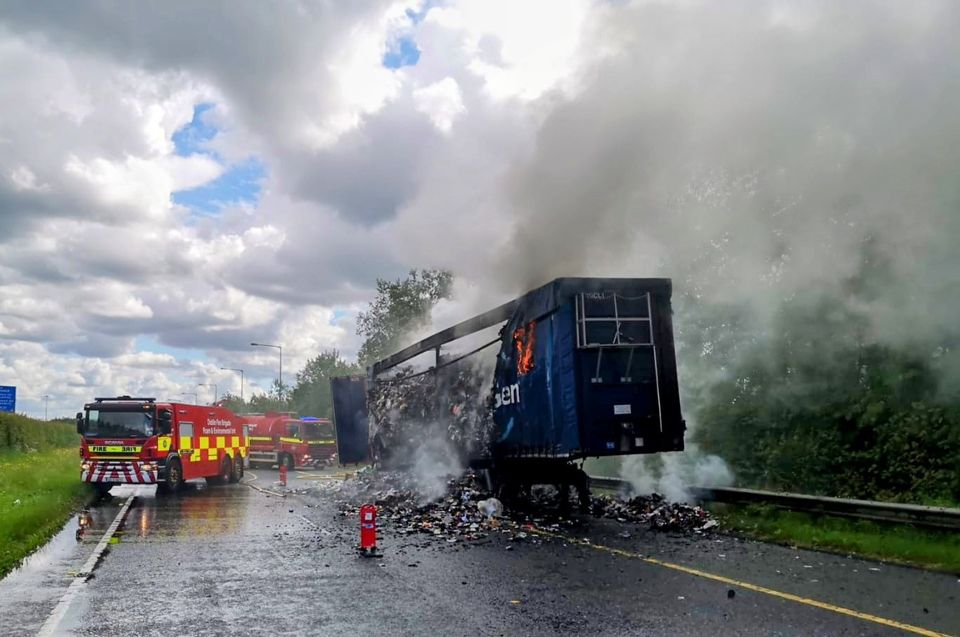 Firefighters battling a blaze on the M1 this evening. Photo: Dublin Fire Brigade.