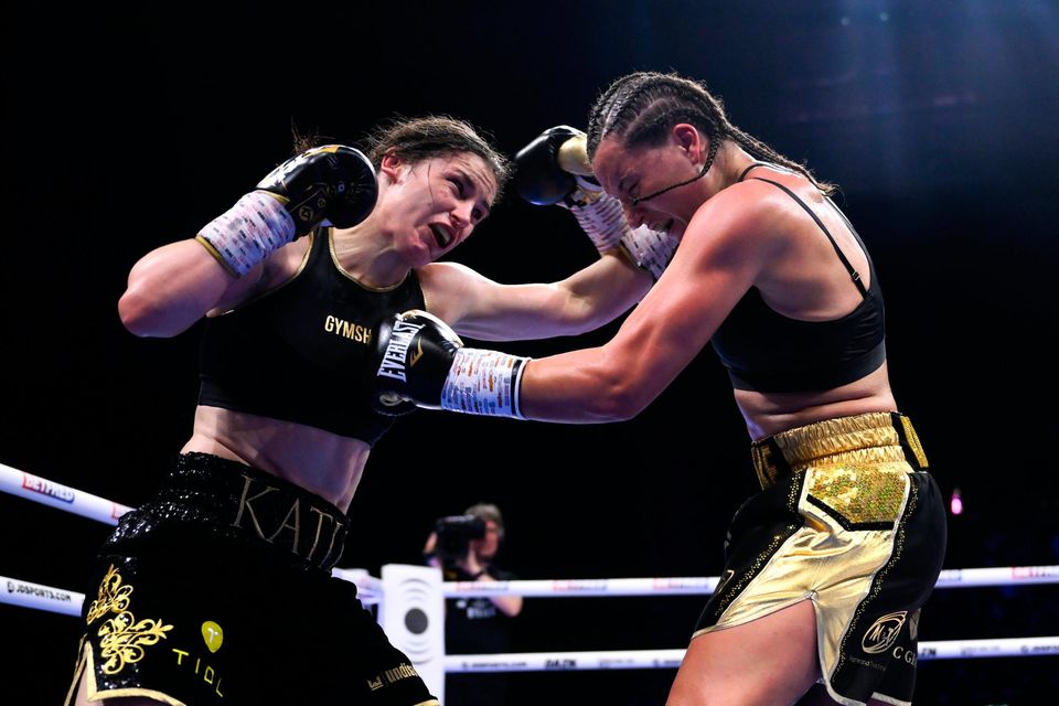 Katie Taylor, left, and Chantelle Cameron during their undisputed super lightweight championship fight at the 3Arena in Dublin last Saturday. Photo: Stephen McCarthy/Sportsfile