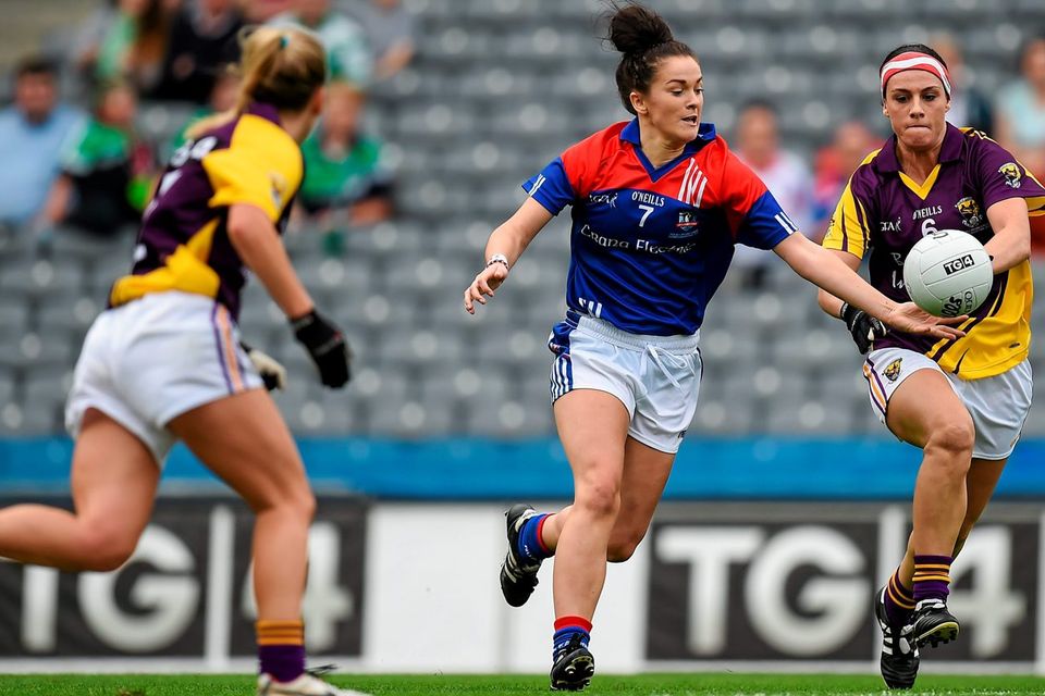 New York's Ciara Scally in action against Wexford's Catriona McCabe. Brendan Moran / SPORTSFILE