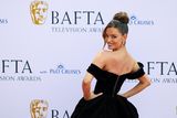 thumbnail: Maura Higgins poses on the red carpet at the 2024 BAFTA Television Awards in London, Britain, May 12, 2024. REUTERS/Hollie Adams