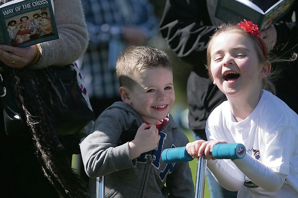 Cian Carroll (4) and Jo Malone (5) at a Way of the Cross in the Phoenix Park. Picture: Gareth Chaney/Collins