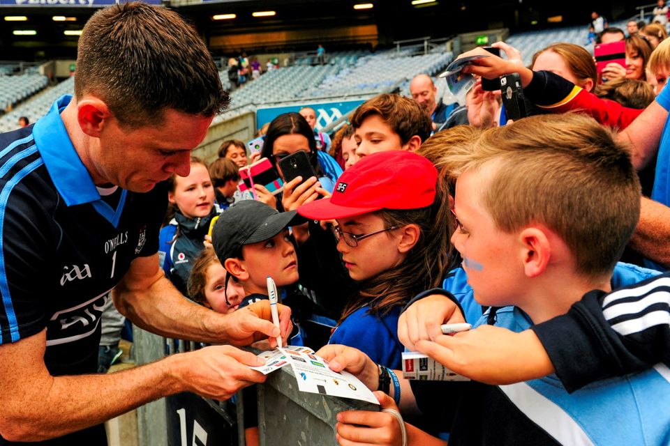 12 July 2015; Dublin captain Stephen Cluxton signs autographs for young fans after the game. Leinster GAA Football Senior Championship Final, Westmeath v Dublin, Croke Park, Dublin. Picture credit: Tom?s Greally / SPORTSFILE