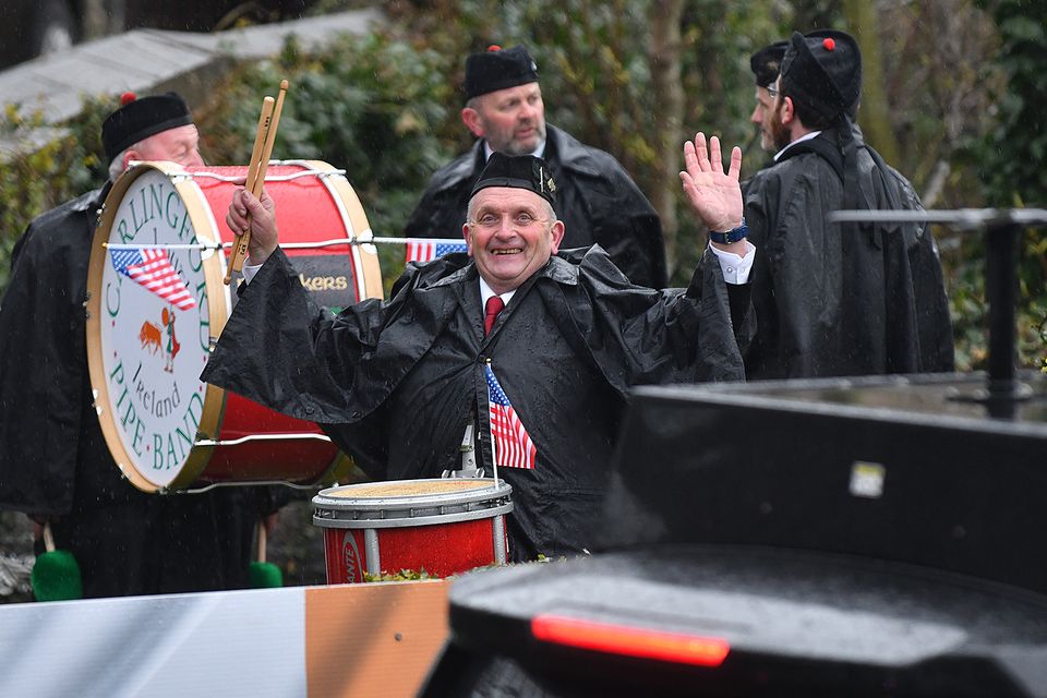 Smiling in the rain.....pictured during the visit of President Biden to Carlingford. Photo: Ken Finegan/www.newspics.ie
