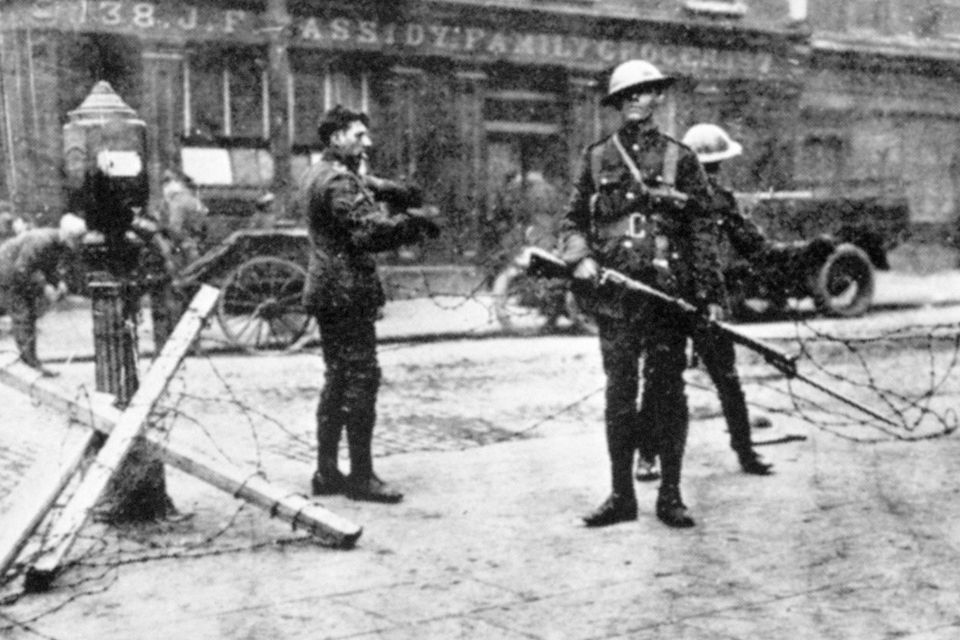File photo dated 30/04/1916 of British troops at a road block outside Cassidy's Grocery during the Easter Rising in Dublin, 1916. Photo: PA/PA Wire
