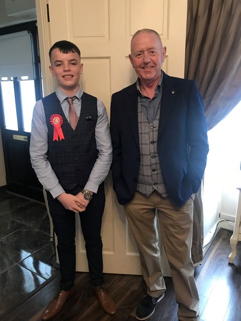 Family man Tony Rogers with his grandson Kyle on his Confirmation day