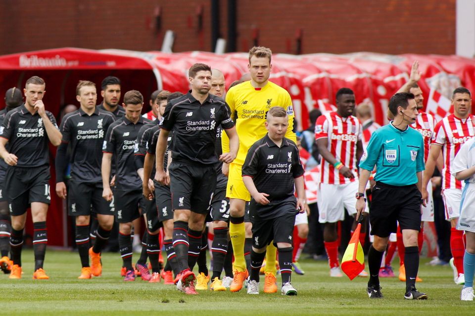 Football - Stoke City v Liverpool - Barclays Premier League - Britannia Stadium - 24/5/15
Liverpool's Steven Gerrard leads his team out before the game
Action Images via Reuters / Ed Sykes