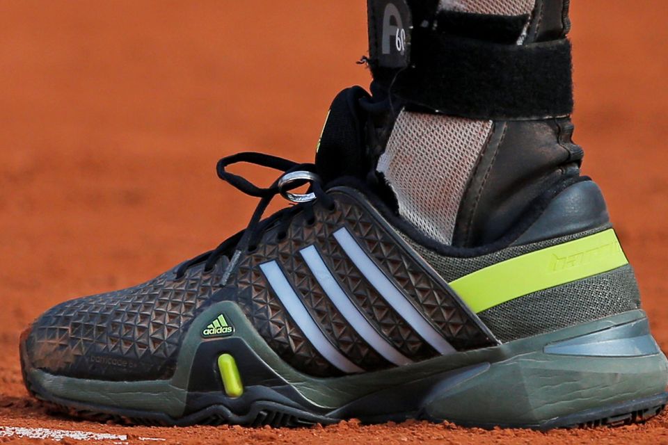 Andy Murray’s wedding ring attached to his shoe as he plays Facundo Arguello at Roland Garros yesterday
